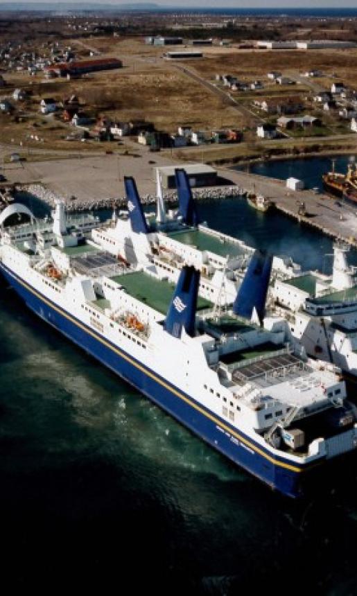 Image of the MV Joseph and Clara Smallwood beside another Marine Atlantic Vessel